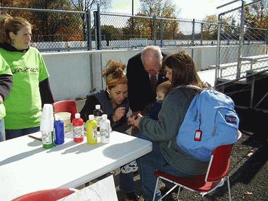 Senator Larkin at Childrens Paint Booth